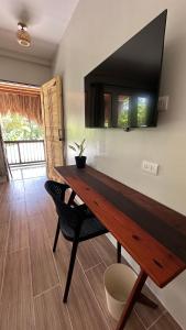 TV a/nebo společenská místnost v ubytování Aulea Siargao