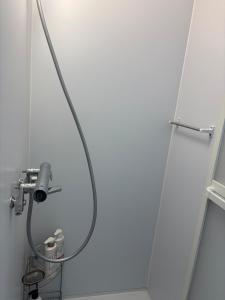 Koupelna v ubytování 釧路貸切最大11人戸建静観な住宅街で空港も近い