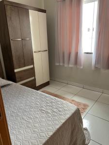 Postel nebo postele na pokoji v ubytování Casa em Penha