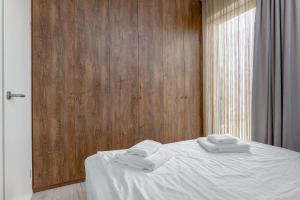 En eller flere senge i et værelse på Holiday Home + 26 billeder