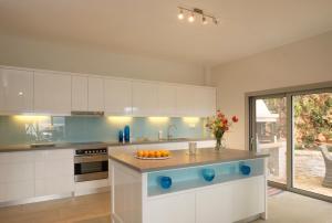 Кухня или мини-кухня в Villa Christianna
