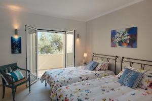 Кровать или кровати в номере Villa Christianna