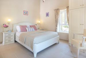 Postel nebo postele na pokoji v ubytování Thodoris House