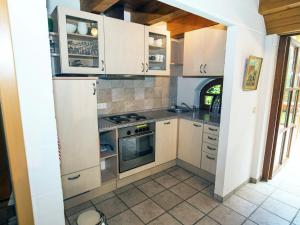 Kuchyň nebo kuchyňský kout v ubytování Ferienhaus Boschhuys