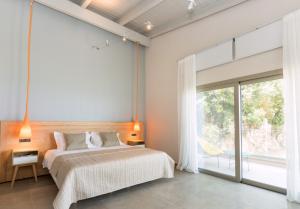 Кровать или кровати в номере Callista