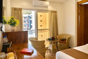 Postel nebo postele na pokoji v ubytování Check Inn Homes, Rishikesh Tapovan