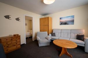 Posezení v ubytování Haus Sonnenwinkel Bungalow 4