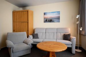 Posezení v ubytování Haus Sonnenwinkel Bungalow 4