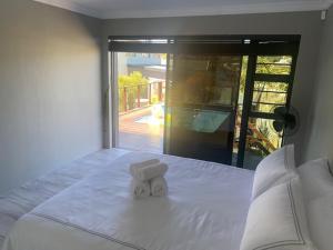 En eller flere senge i et værelse på City and Sea 1-4 Guests + 5 billeder