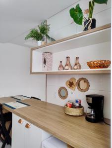 Кухня или мини-кухня в Apartamento à 3min do Aeroporto
