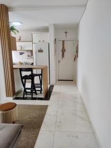 Кухня или мини-кухня в Apartamento à 3min do Aeroporto
 +3 фотографии