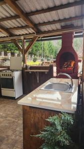 Kuchyň nebo kuchyňský kout v ubytování Cabana Pinolera