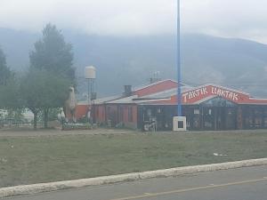 a building with a llama statue in front of it at DEPARTAMENTO a ESTRENAR - TUCUMAN in San Miguel de Tucumán