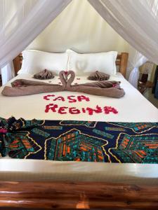 Ένα ή περισσότερα κρεβάτια σε δωμάτιο στο Casa Regina