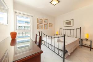 En eller flere senge i et værelse på A02 - Casa Topazio in Quarteira + 53 billeder