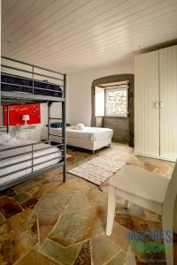 Ένα ή περισσότερα κρεβάτια σε δωμάτιο στο Casa dos Calços