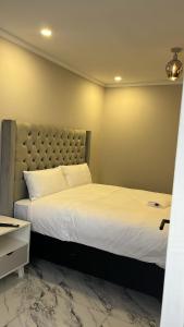 En eller flere senge i et værelse på Southridge Guest House + 31 billeder