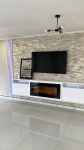 Et tv og/eller underholdning på Southridge Guest House