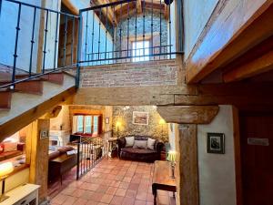 Ένα ή περισσότερα κρεβάτια σε δωμάτιο στο Saltus Abus, espectacular conjunto rural en Sotosalbos, 10min de Segovia +59 φωτογραφίες