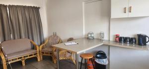 Kuchyň nebo kuchyňský kout v ubytování HartebeesDen