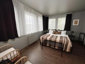 Postel nebo postele na pokoji v ubytování Hotel Leifur Eiriksson