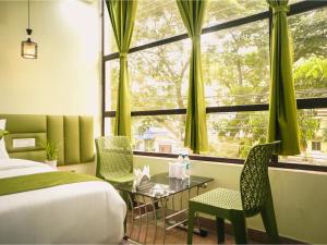 Postel nebo postele na pokoji v ubytování Hotel Raventa