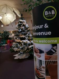 Un certificado, premio, letrero u otro documento en B&B HOTEL Aurillac Le Lioran