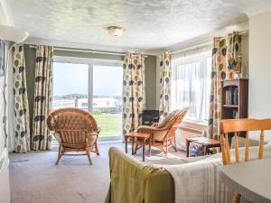 Et opholdsområde på Apartment 1 Waterrs Edge + 8 billeder