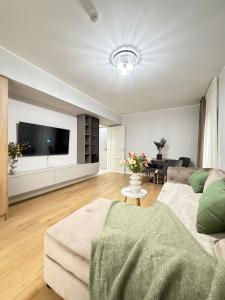 Et opholdsområde på Luxury Glam Apartments Unique Building near Palas