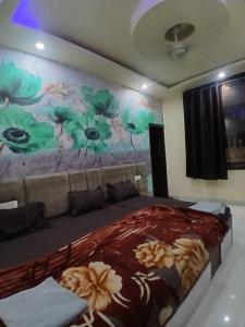 Postel nebo postele na pokoji v ubytování Agam homestay- Few steps walk From Golden Temple