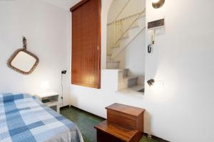Giường trong phòng chung tại Lerici - Il Terrazzino Di Zia