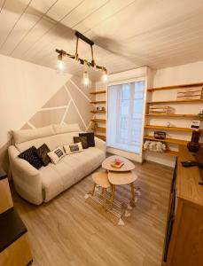 Et opholdsområde på L'Escapade Pannessac troisième étage