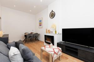 Телевизор и/или развлекательный центр в Immogroom - 1Bedroom - CityCenter - AC