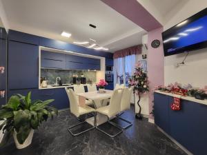 Et tv og/eller underholdning på TABATA FITNESS Apartments DEVA