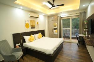 Giường trong phòng chung tại The Empire Stays , Golf Course Road +81 ảnh