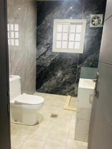 Koupelna v ubytování فندق مسار الأمل الذهبي - أثمان سابقاً