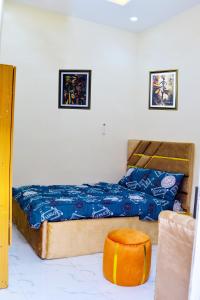 Ένα ή περισσότερα κρεβάτια σε δωμάτιο στο Eazy home