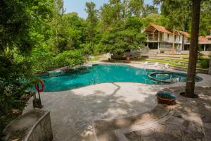 Bazén v ubytování The Birchwood Retreat, Madikeri nebo v jeho okolí