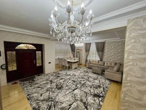 Posezení v ubytování Quba Şah Villa + 9 fotografií