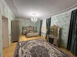 Postel nebo postele na pokoji v ubytování Quba Şah Villa