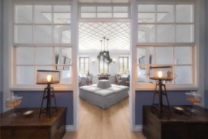 a living room with a couch and a table at Apeiros Chora Hotel in Kato Pedina