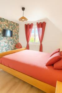 En eller flere senge i et værelse på Proche Europa-Park & Marchés de Noël - 6 pers