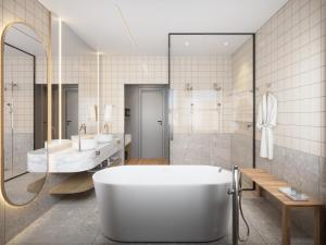 ein Bad mit einer Badewanne, 2 Waschbecken und einer Dusche in der Unterkunft Slaviero Prime Campo Grande in Campo Grande