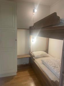 En eller flere senge i et værelse på Sentral, Hc-Friendly Apartment