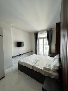 Postel nebo postele na pokoji v ubytování Apartment 3BR 2WC Hacom Phan Rang