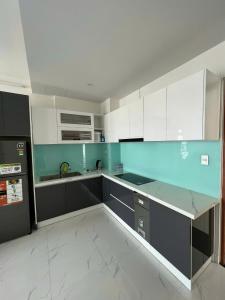 Kuchyň nebo kuchyňský kout v ubytování Apartment 3BR 2WC Hacom Phan Rang