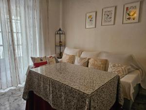 Postel nebo postele na pokoji v ubytování Casa de La Abuela Pepi