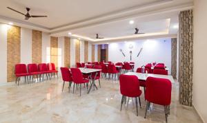 Khu vực ghế ngồi tại Treebo Samsara Villas And Spa