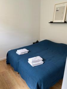 En eller flere senge i et værelse på Cosy apartment 4 in Historic Abbey