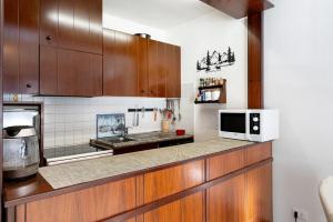 Kuchyň nebo kuchyňský kout v ubytování Casadegli Orsi Madonna Di Campiglio